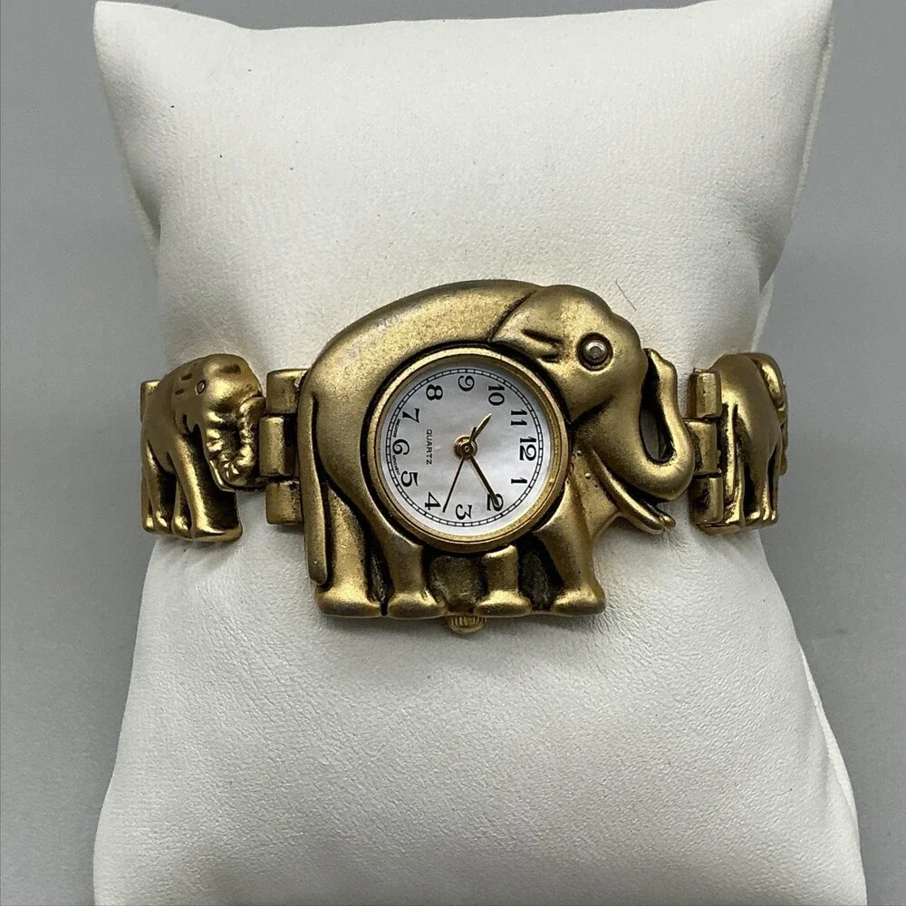 Womens Watch 31mm White Dial Gold Tone Elephant Bracelet New Battery 6.5